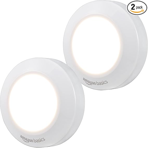 Amazon Basics LED Puck Lights, Battery Operated, 50 Lumens, Under Cabinet Lighting, Easy to Install, Easy to Use, Adhesive Backing, 2-Pack, White